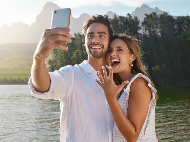 Happy Couple Sharing Engagement News